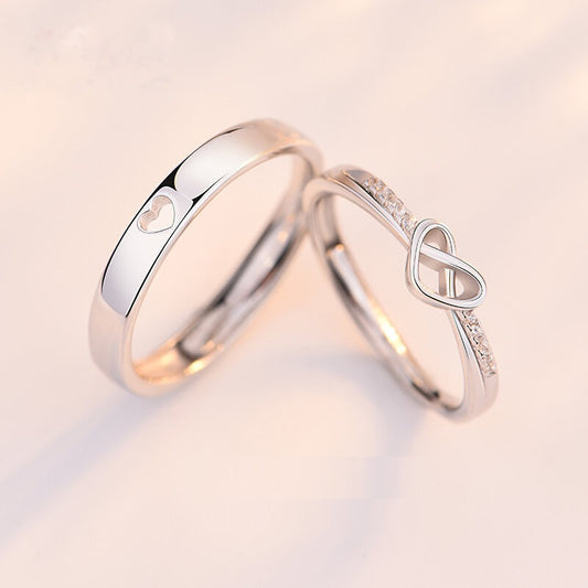 Minimalist platinum-tone heart-shaped matching couple rings for men and women, elegant promise ring set.