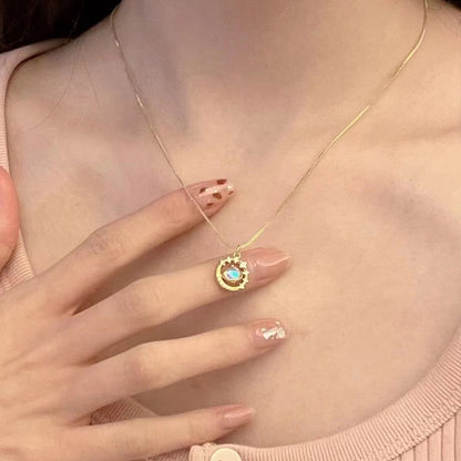 The Saturnia Orbit – Radiant Galaxy Pendant with Crystal Halo