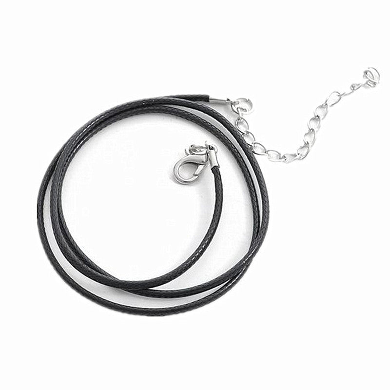 The Voyager Tail – Minimalist Ocean-Inspired Pendant on Braided Leather