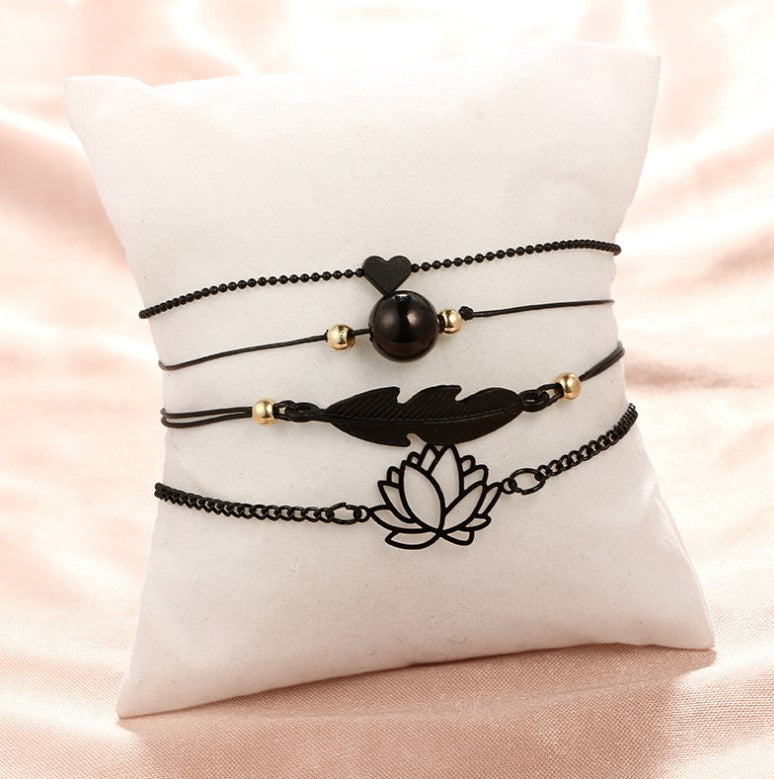 Midnight Zen Matte Black Bracelet Set | Bohemian Lotus & Feather Charms 4-Piece Stack