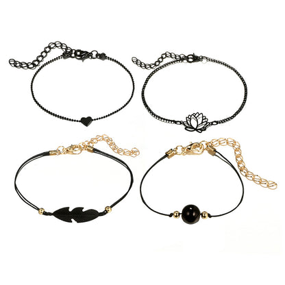 Midnight Zen Matte Black Bracelet Set | Bohemian Lotus & Feather Charms 4-Piece Stack