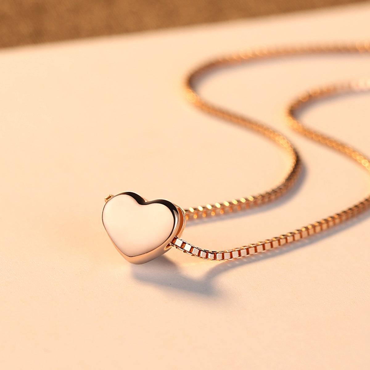 The Rose Aura Heart Solitaire – Minimalist Rose-Toned Box Link Chain