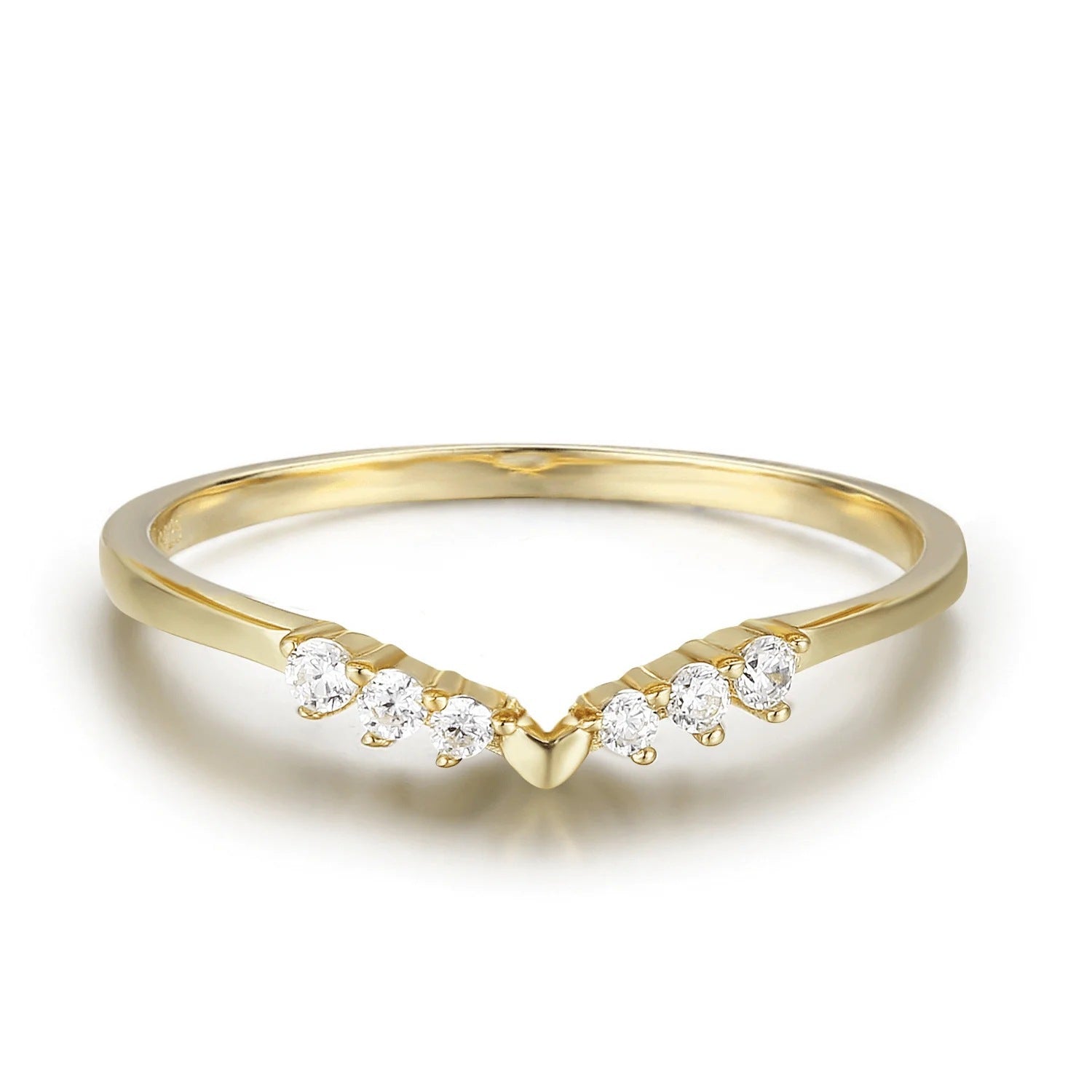 A high-polish gold chevron wishbone ring featuring a V-shaped band set with sparkling round crystals on a white background.