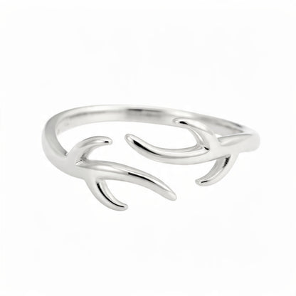 A polished sterling silver adjustable ring shaped like open antlers, centered on a pure white background with no shadows or reflections.