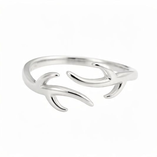 A polished sterling silver adjustable ring shaped like open antlers, centered on a pure white background with no shadows or reflections.